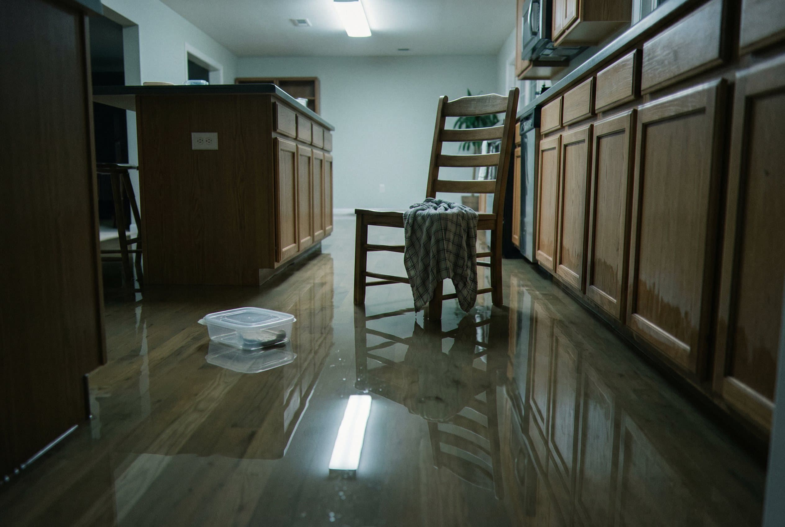 Standing water pooling basement floor
